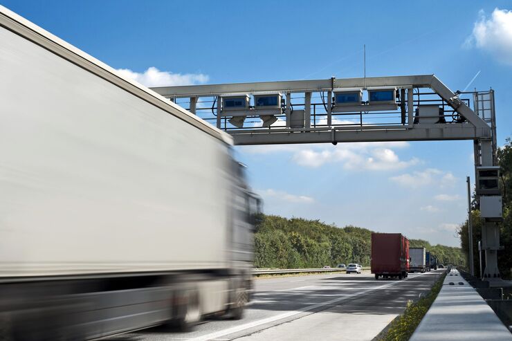 Truck toll system, german highway - control gantry, motion blur on truck